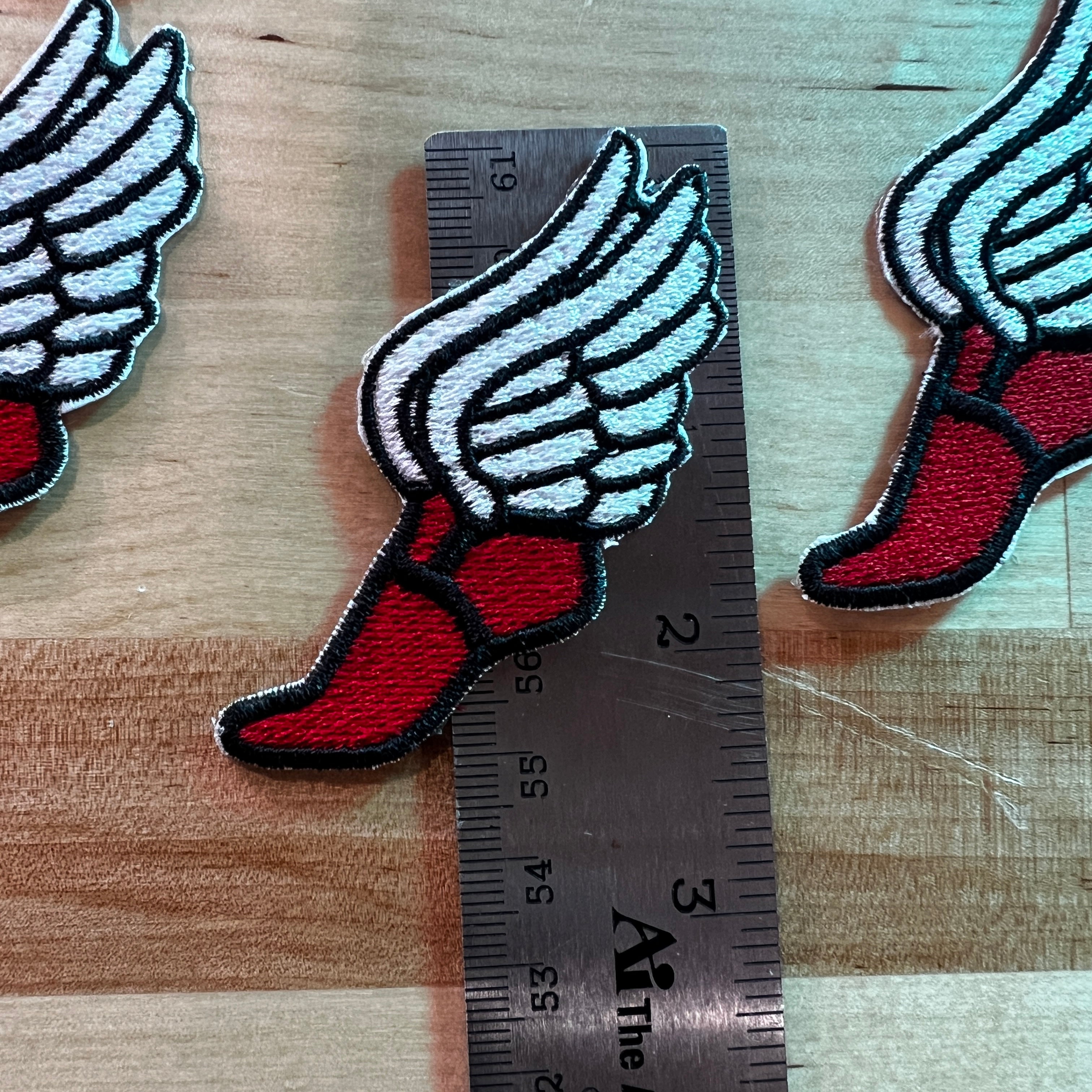 Iron on Winged Track Feet Embroidery Patches (4 Pack)